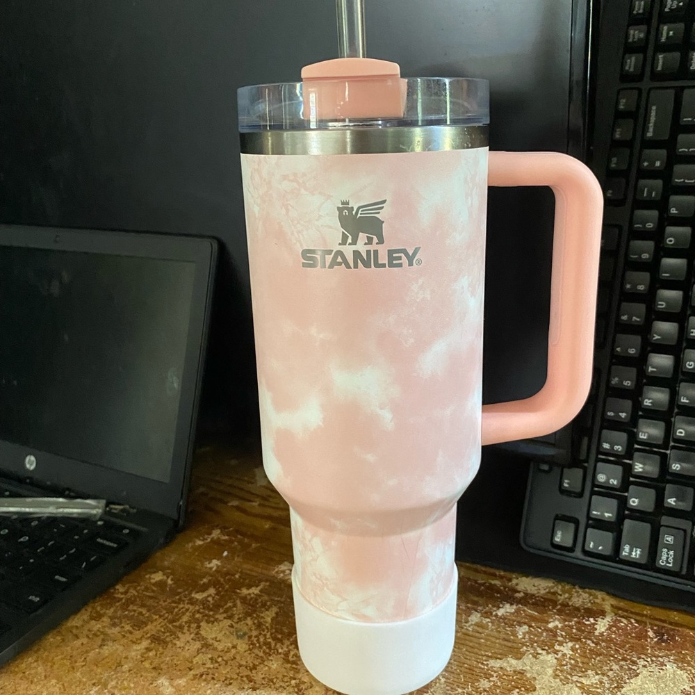 Peach tie dye Stanley with white boot.